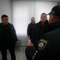 Заступник Начальника ОВА Андрій Кавунець та поліцейські у приміщенні